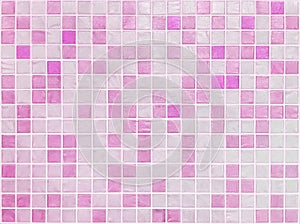 Closeup surface tiles pattern at pink tiles in bathroom wall texture background