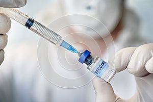 Closeup of syringe and injection vial flu virus vaccine disease prepare for human, child, adult, pregnant woman clinical trials