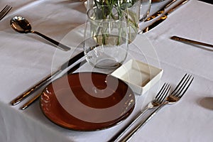 Closeup of tablewares on table in restaurant