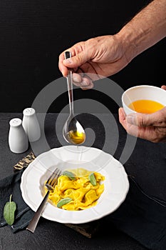 Closeup of tasty appetizing ravioli white plate