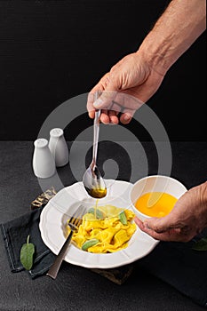 Closeup of tasty appetizing ravioli white plate