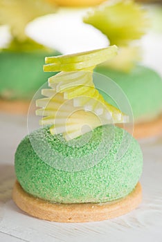 Closeup tasty cake with green apple and pear