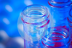 Closeup of test tubes with red liquid in laboratory