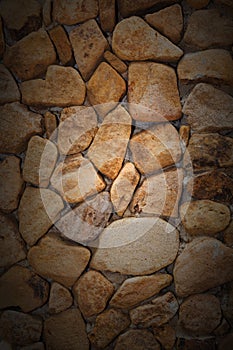 Closeup Texture Background Image of Natural rock or Stone arrange in Pattern as Wall