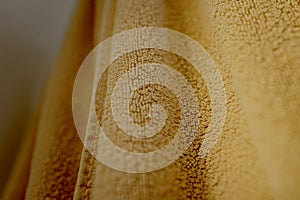 Closeup textures of light beige towel.