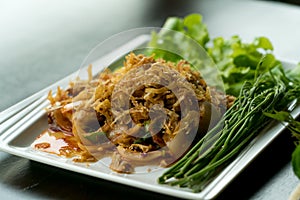 Closeup Thai food spicy salad oyster with fried garlic and vegetable