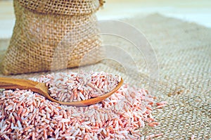 Closeup of Thai rice berry in spool on hemp