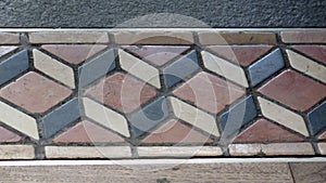 Closeup of Three dimentiol floor tile border design