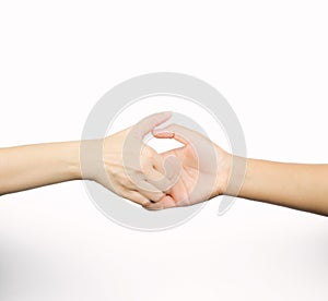 Closeup thumb wrestle between two people, a symbol of competition isolated on white background photo