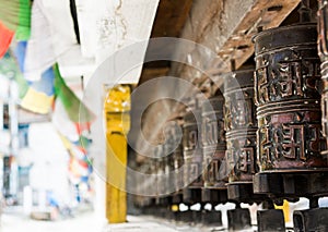 Closeup of Tibetan praying wheels.