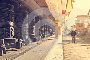 Closeup of Tibetan praying wheels.