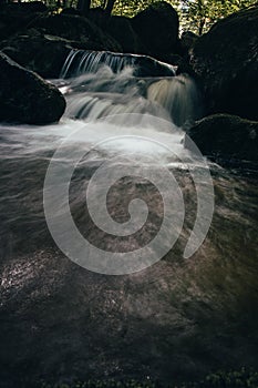 Closeup of a tidal wave from a river that stormed after a flood. Jizera Mountains, Czech Republic