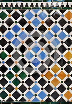 Closeup of tiles, azulejos in Alhambra palace of Granada, Spain photo