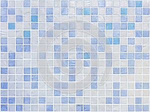 Closeup surface tiles pattern at blue tiles in bathroom wall texture background