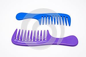 Closeup to Blue and Purple Plastic Comb, Isolated