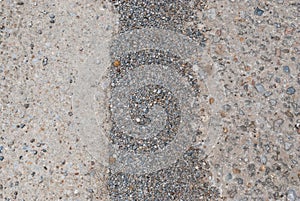 Closeup to Pavement with Concrete Walk Way Background