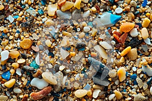 Closeup to sea ocean beach sand with micro plastics. Environment, pollution, plastic waste concept