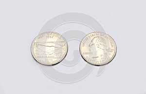 Closeup to West Virginia State Symbol on Quarter Dollar Coin on White Background