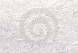 Closeup to white crumpled paper texture background,abstract