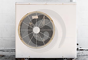 Closeup to White Outdoor Air Conditioner Compresser