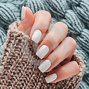 Closeup to woman hands with elegant neutral colors manicure. Beautiful natural looking white nail polish , generated by