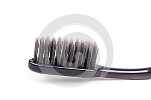 Closeup of toothbrush charcoal soft and slim tapered bristle