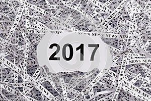 Closeup torn pieces and tapes of paper with the word 2017.