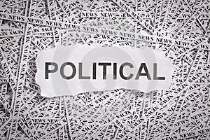 Closeup torn pieces and tapes of paper with the word POLITICAL.