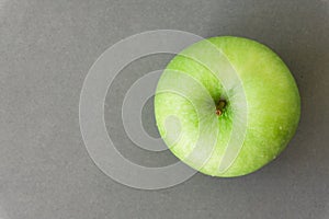 Closeup tov view green fresh apples fruit on grey background , h