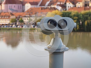 Closeup of a tower viewer near a river
