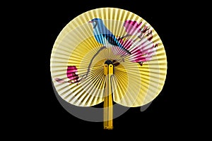 Closeup of Traditional Chinese fan on black background