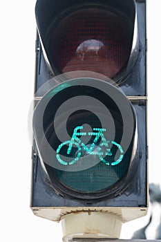 Closeup traffic cyclists green light bike concept