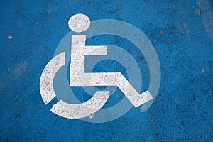 Closeup of a traffic sign in a disabled parking lot