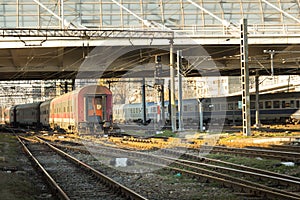 Closeup of train entering into a rail station in Romania