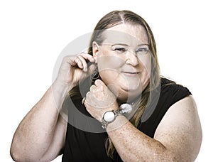 Closeup of Transgender Woman Adjusting and Earring