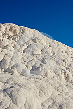 Closeup of travertine pools and terrace in Pamukkale, Turkey in a famous tourism holiday or vacation destination. Cotton