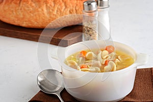 Closeup turkey noodle soup with carrots