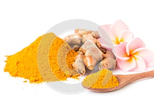 Closeup turmeric powder and turmeric roots on white background f