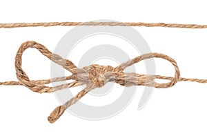 Closeup of twine node or knot with bow and one rope isolated on a white background. Decoration background