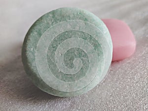 Closeup of two bar soaps