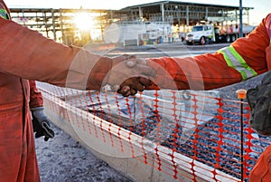 Closeup of two engineers shaking hands