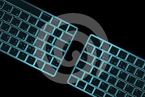Closeup of a two modern blue computer keyboard keys isolated on black background. Close up view of a business workplace with