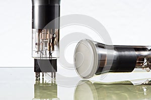 Closeup of two old electronic vacuum tubes