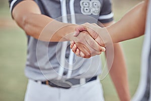 Closeup of two sportsmen shaking hands before a game. Hands pf baseball players congratulating each other after winning