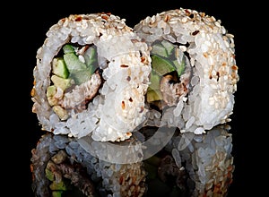 Closeup two sushi rolls california