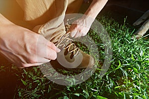 Closeup of tying hiking shoes