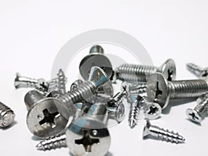 Closeup with type of screws with white background.