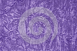 Closeup ultra violet color velvet fabric sample texture backdrop