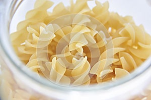 Closeup of uncooked Italian spiral pasta