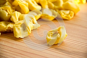 Closeup of uncooked tortellini on the table